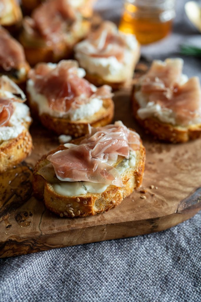 Grilled Pear Gorgonzola Prosciutto Crostini